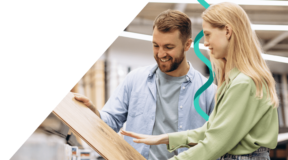 Couple viewing floor samples in a DIY store